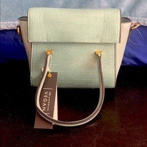 Mint green mini purse 7.5 by about 7.5in.